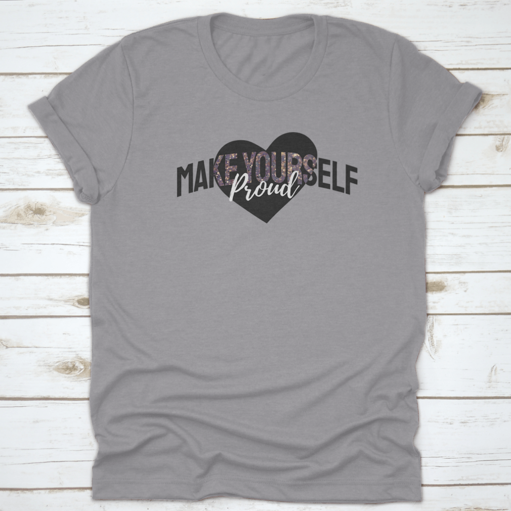 A stylish t-shirt featuring the slogan 'Make Yourself Proud' in glitter on a heart background, showcasing its vibrant design and comfortable fit.