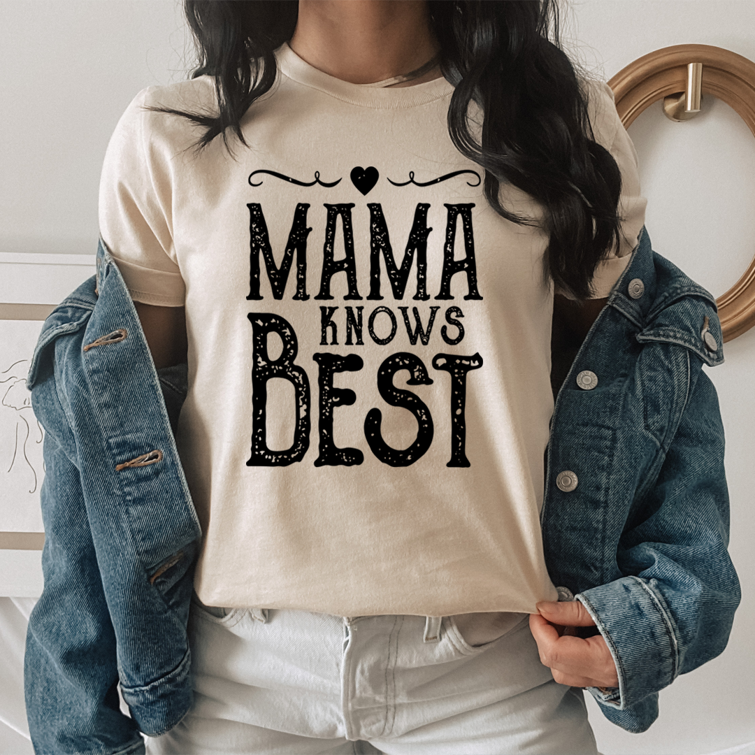 Mama Knows Best T-Shirt displayed on a mannequin, showcasing its soft cotton fabric and double-stitched neckline.