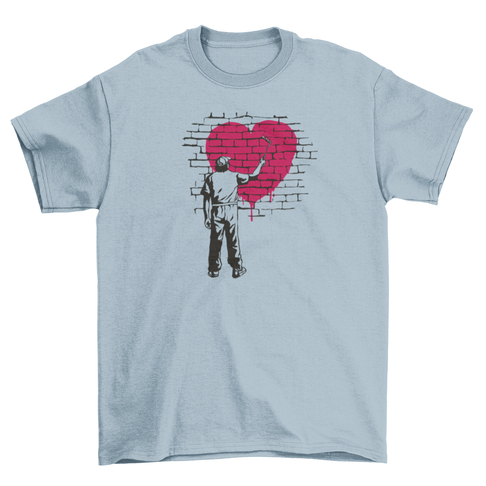 A stylish t-shirt featuring a person painting a vibrant heart on a textured brick wall, showcasing creativity and artistic expression.