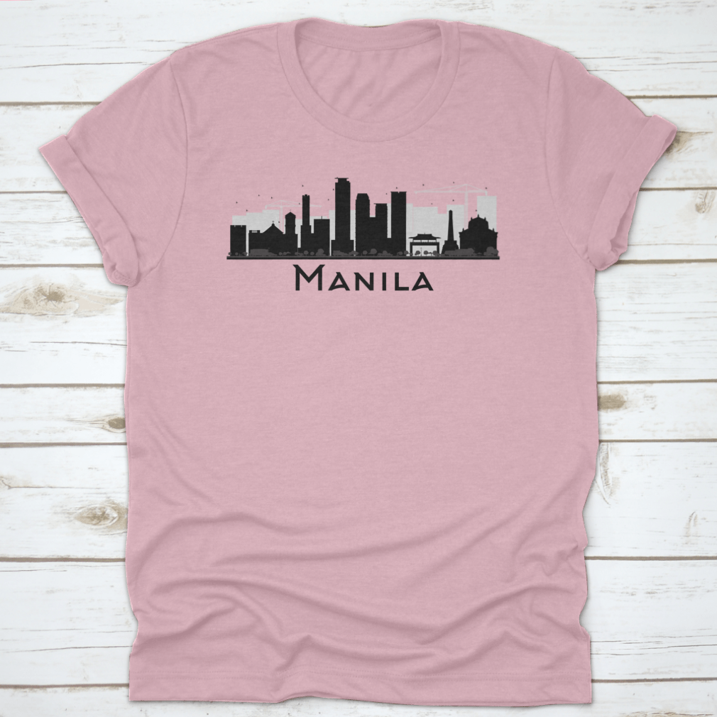 Black and white silhouette of Manila City skyline on a stylish T-shirt, showcasing iconic buildings in a minimalist design.