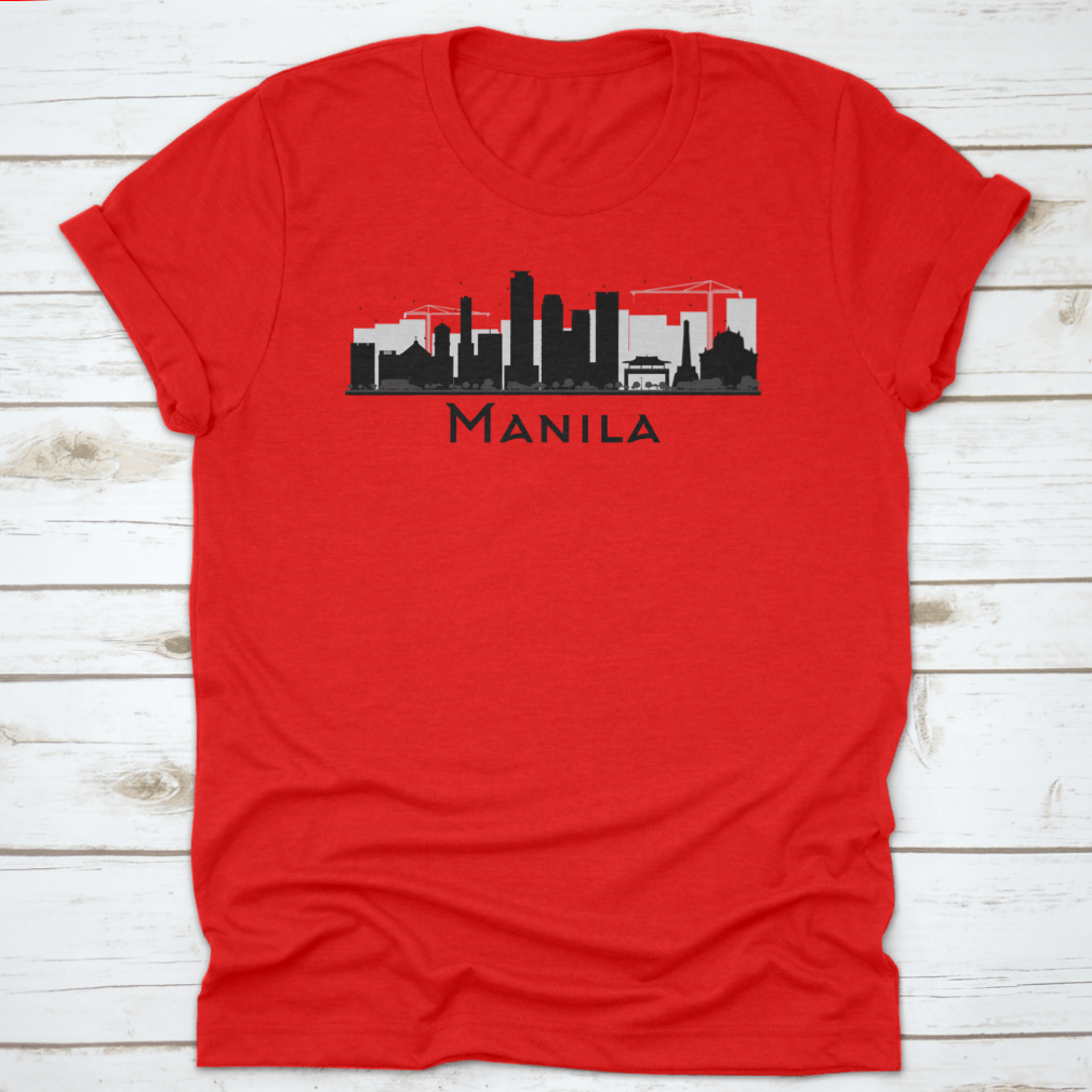 Black and white silhouette of Manila City skyline on a stylish T-shirt, showcasing iconic buildings in a minimalist design.