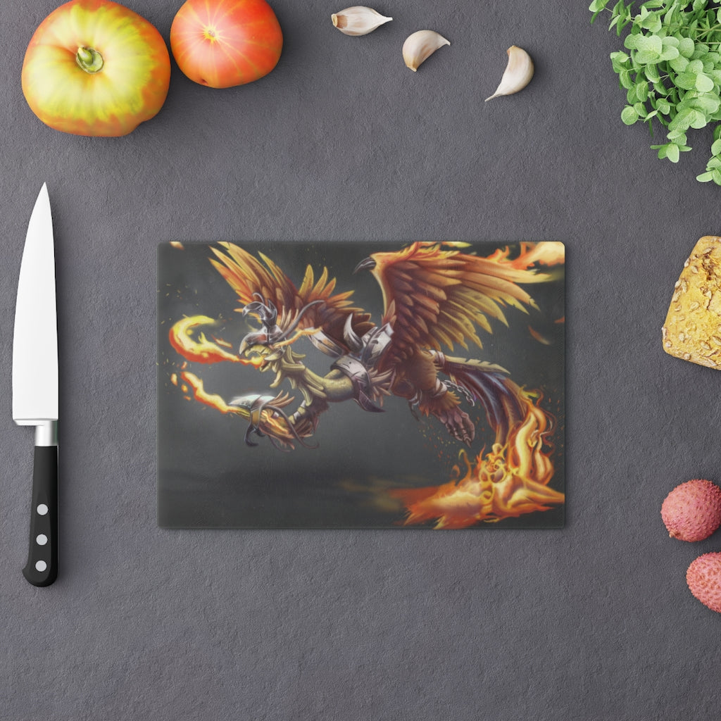 Merciless the Flaming SkyBird Cutting Board made of tempered glass with a vibrant flaming design and rubber dots for stability.