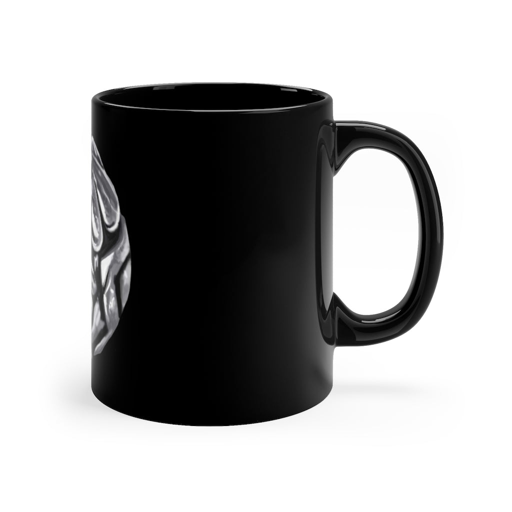 A sleek 11oz black ceramic mug with a C-handle, perfect for coffee, tea, or hot chocolate, showcasing customizable designs.