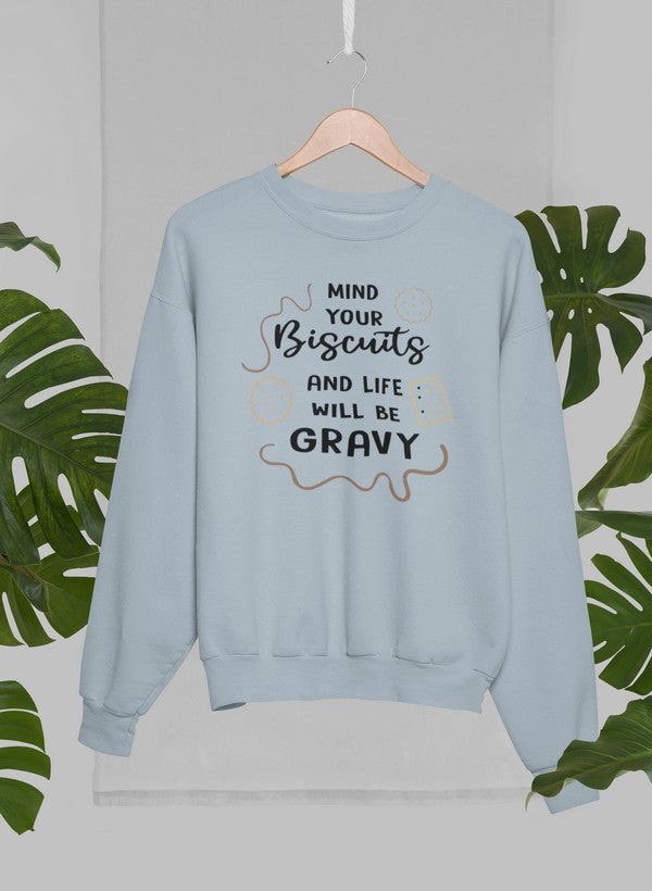 Mind Your Biscuits And Life Will Be Gravy Sweat Shirt featuring a humorous design on a cozy fleece fabric.