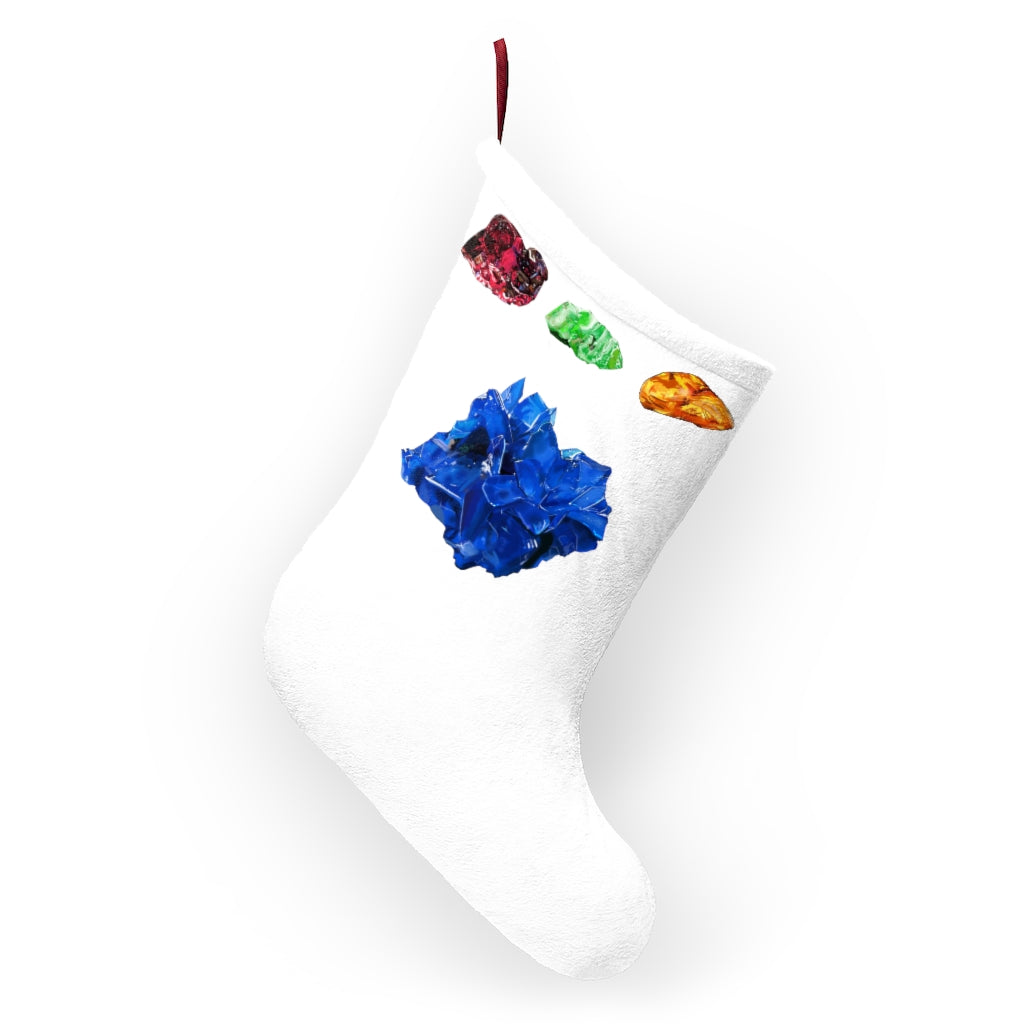 Personalized Minerals Christmas Stockings hanging by a fireplace, showcasing festive designs and a soft fleece texture.