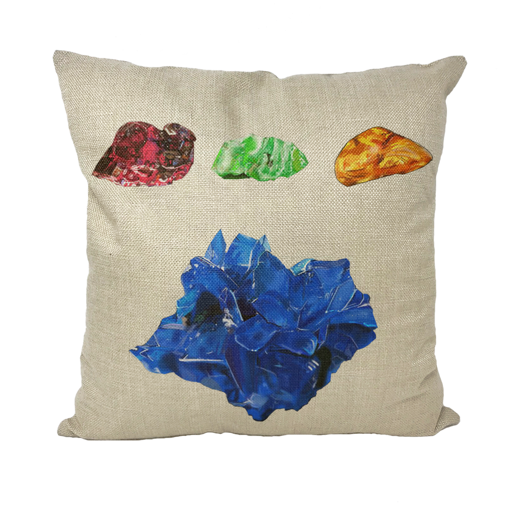 A collection of Minerals Throw Pillows in various styles including linen, canvas, and suede, showcasing their unique textures and colors.