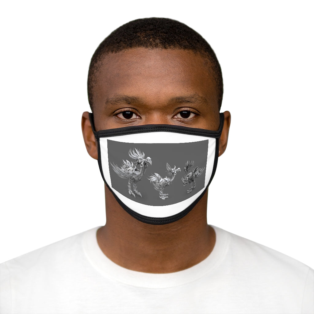 A stylish Mixed-Fabric Face Mask featuring a black outer edge and earloops, made from polyester and cotton for comfort and protection.