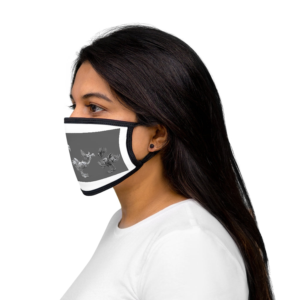 A stylish Mixed-Fabric Face Mask featuring a black outer edge and earloops, made from polyester and cotton for comfort and protection.