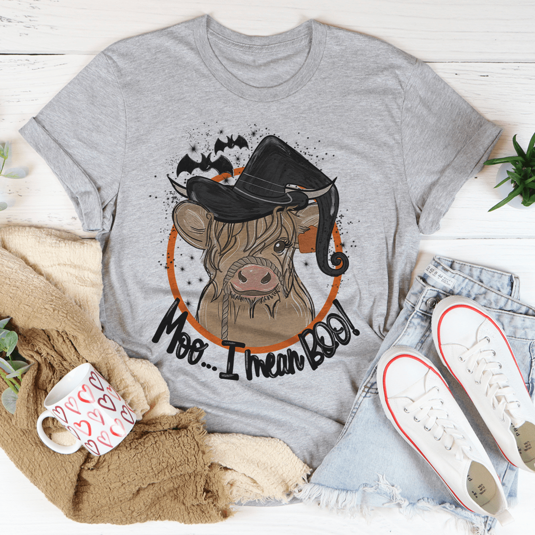 Moo I Mean Boo Cow T-Shirt featuring a playful cow graphic on a soft cotton fabric.