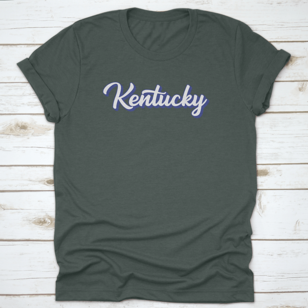 Modern blue hand lettering design of the state name Kentucky on a comfortable cotton shirt.