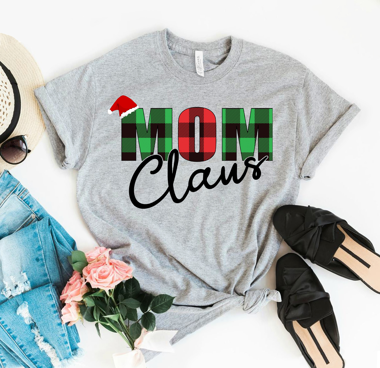 Mom Claus Christmas T-shirt made from premium ring spun cotton, featuring a festive design and available in various sizes.