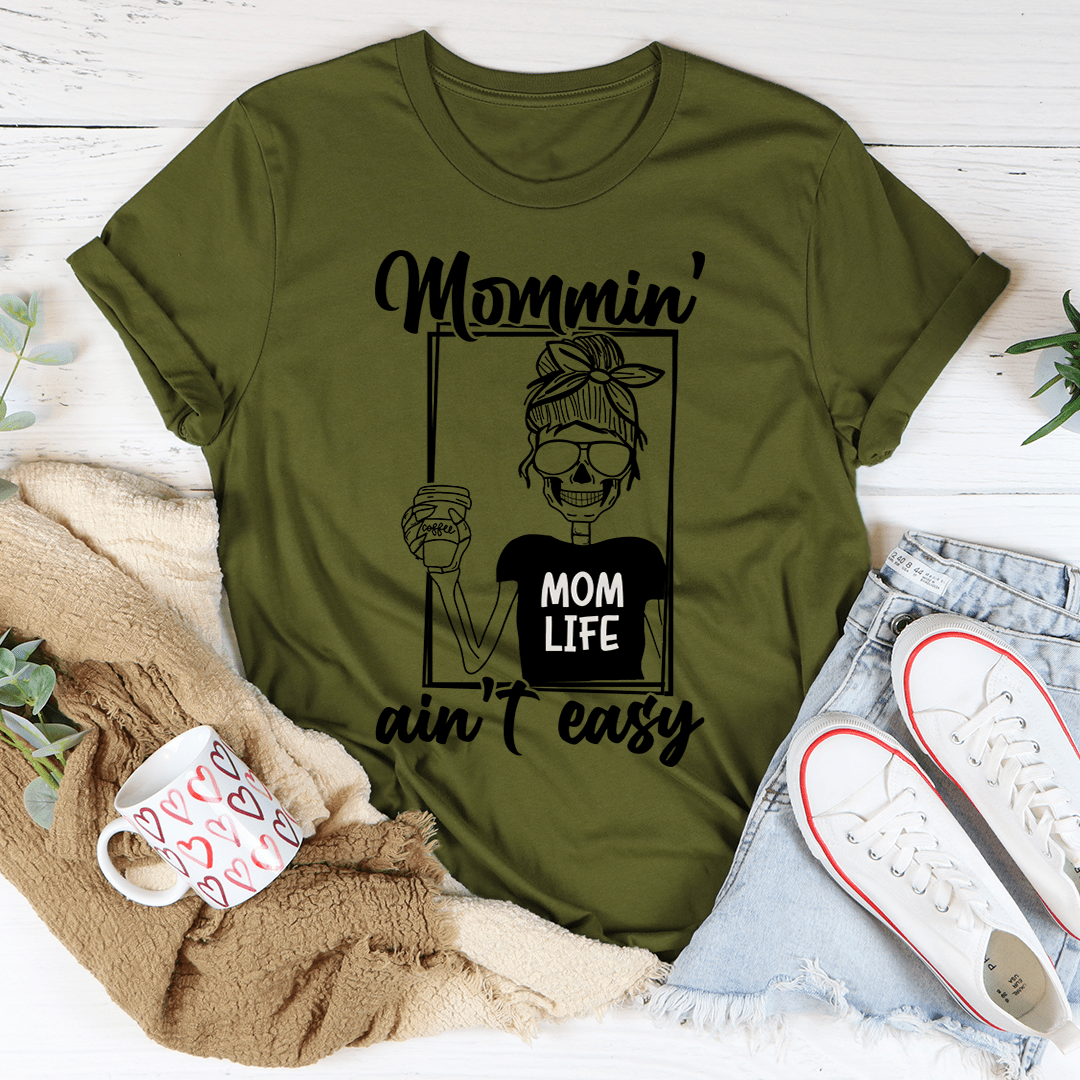 Green "Mommin' ain't easy" T-shirt.