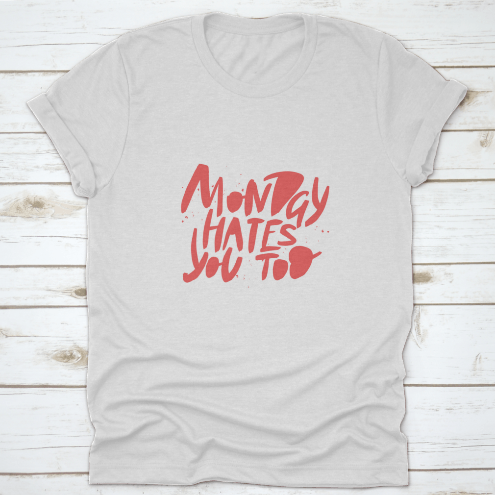 A comfortable Monday Hates You Too T-shirt made from 100% cotton, featuring a humorous design perfect for casual wear.