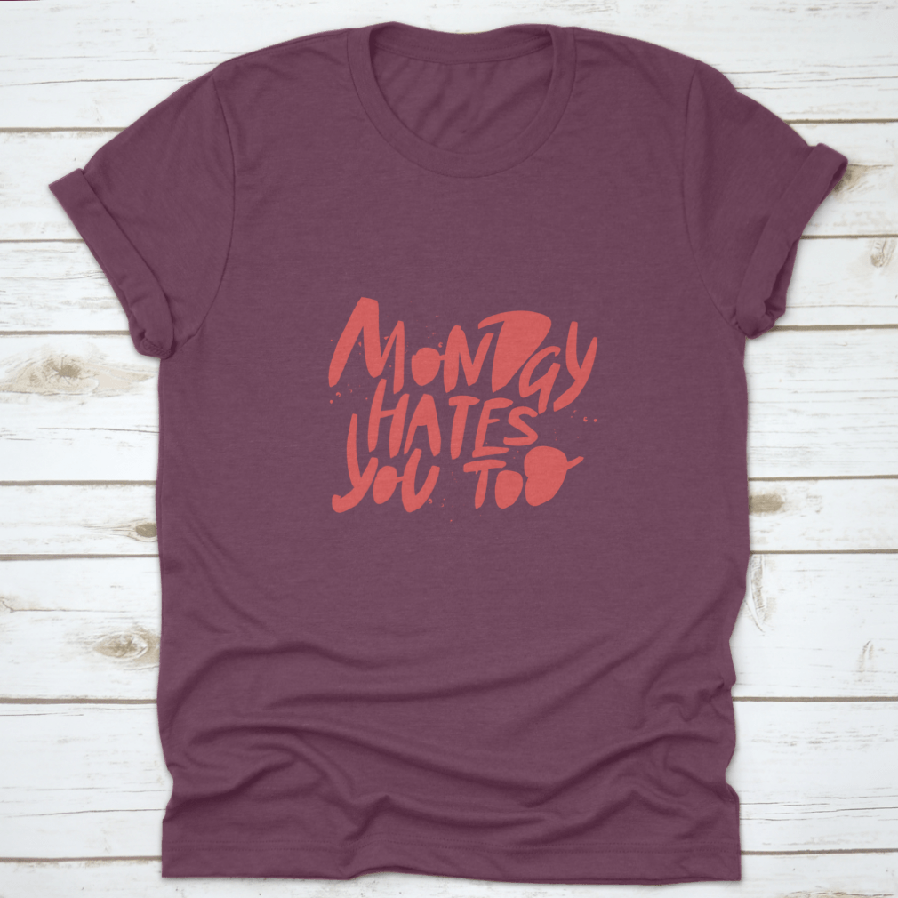 A comfortable Monday Hates You Too T-shirt made from 100% cotton, featuring a humorous design perfect for casual wear.