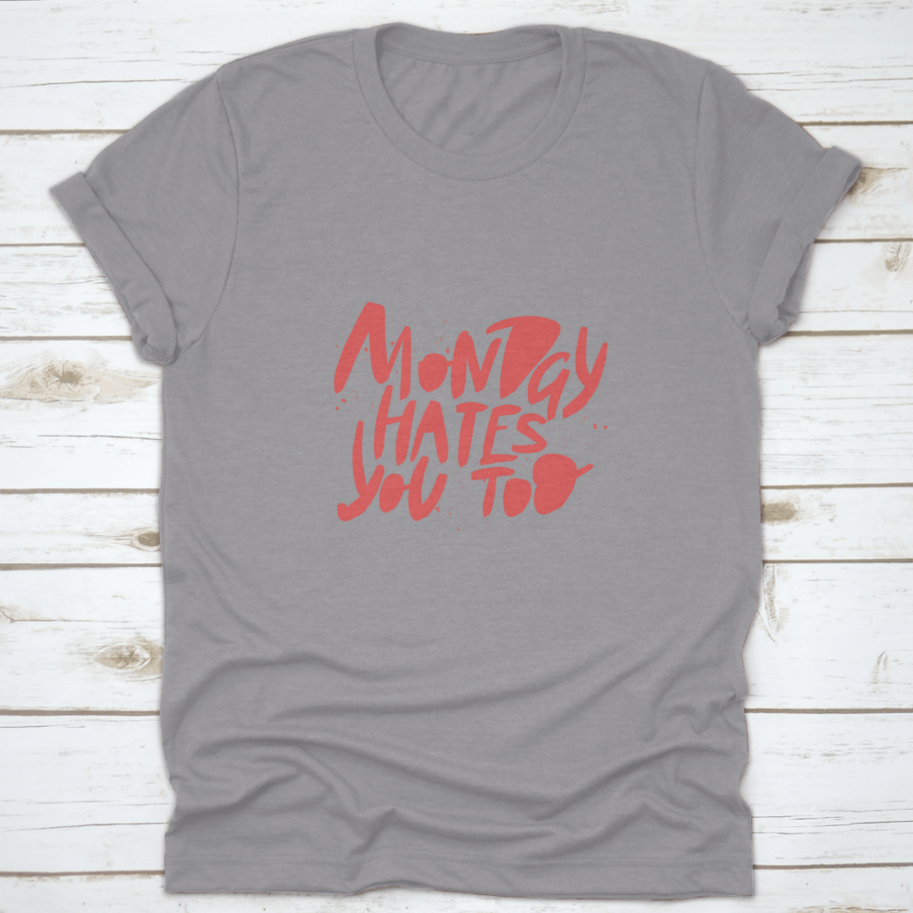 A comfortable Monday Hates You Too T-shirt made from 100% cotton, featuring a humorous design perfect for casual wear.