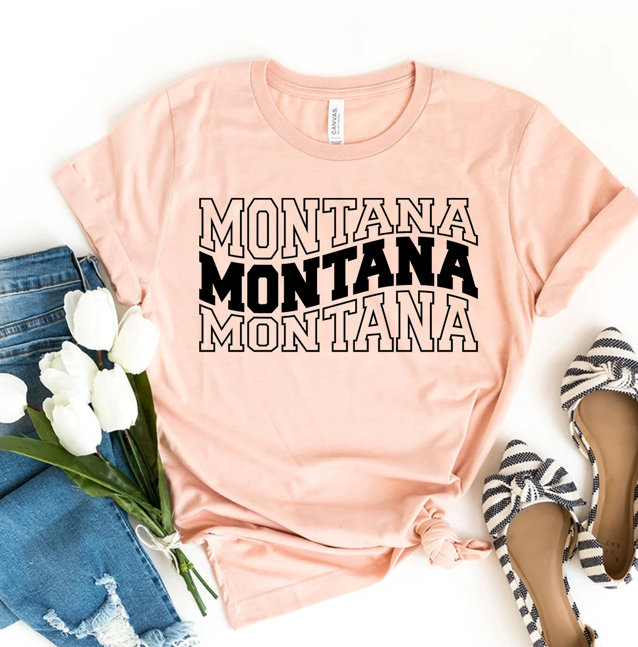 Montana T-shirt made of premium ring spun cotton with vibrant flex print design, available in various sizes.