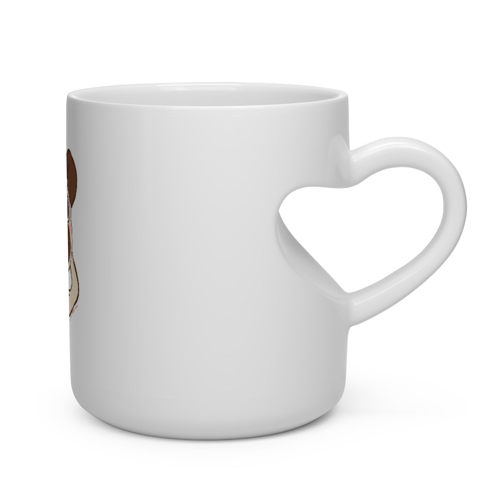 A white ceramic heart-shaped mug with a pug design, perfect for coffee lovers.