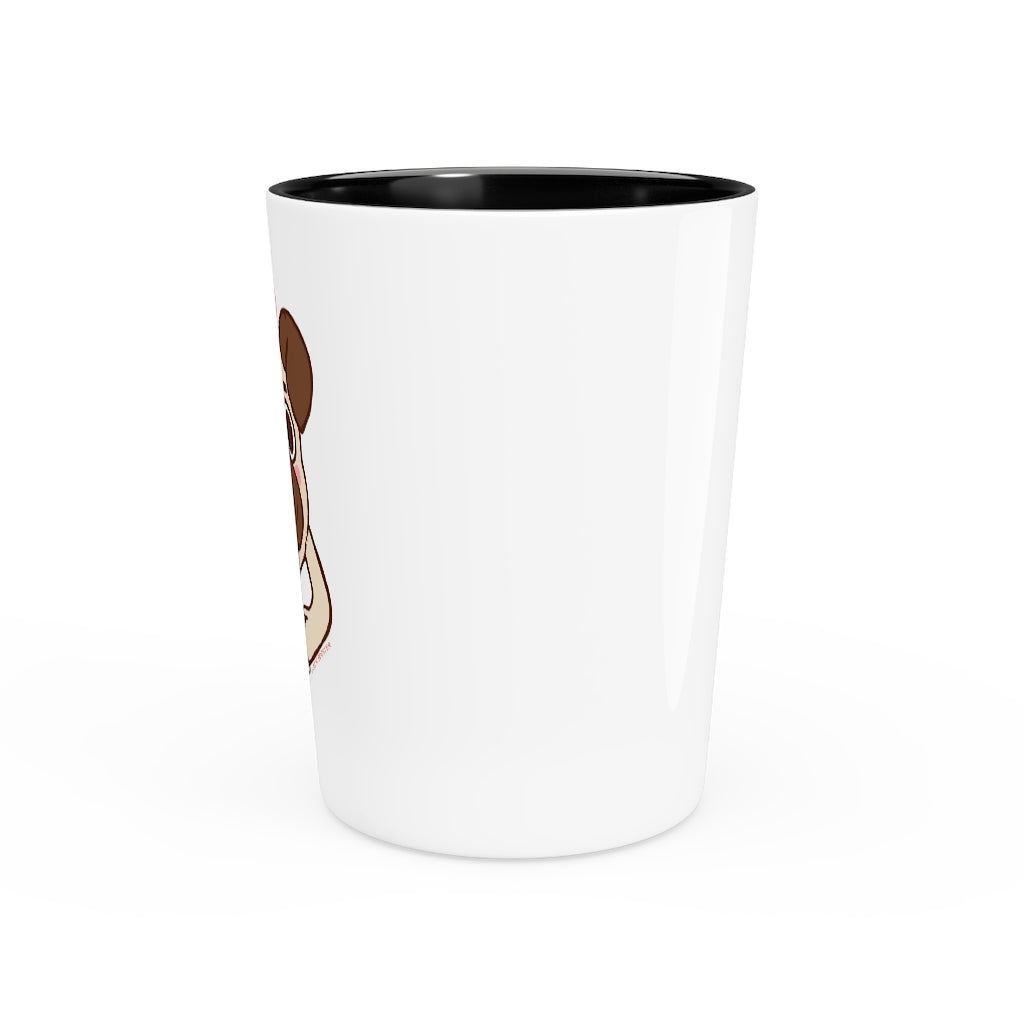 A personalized More Pug Coffee Please shot glass with a white ceramic exterior and a black interior, perfect for gatherings and gifting.