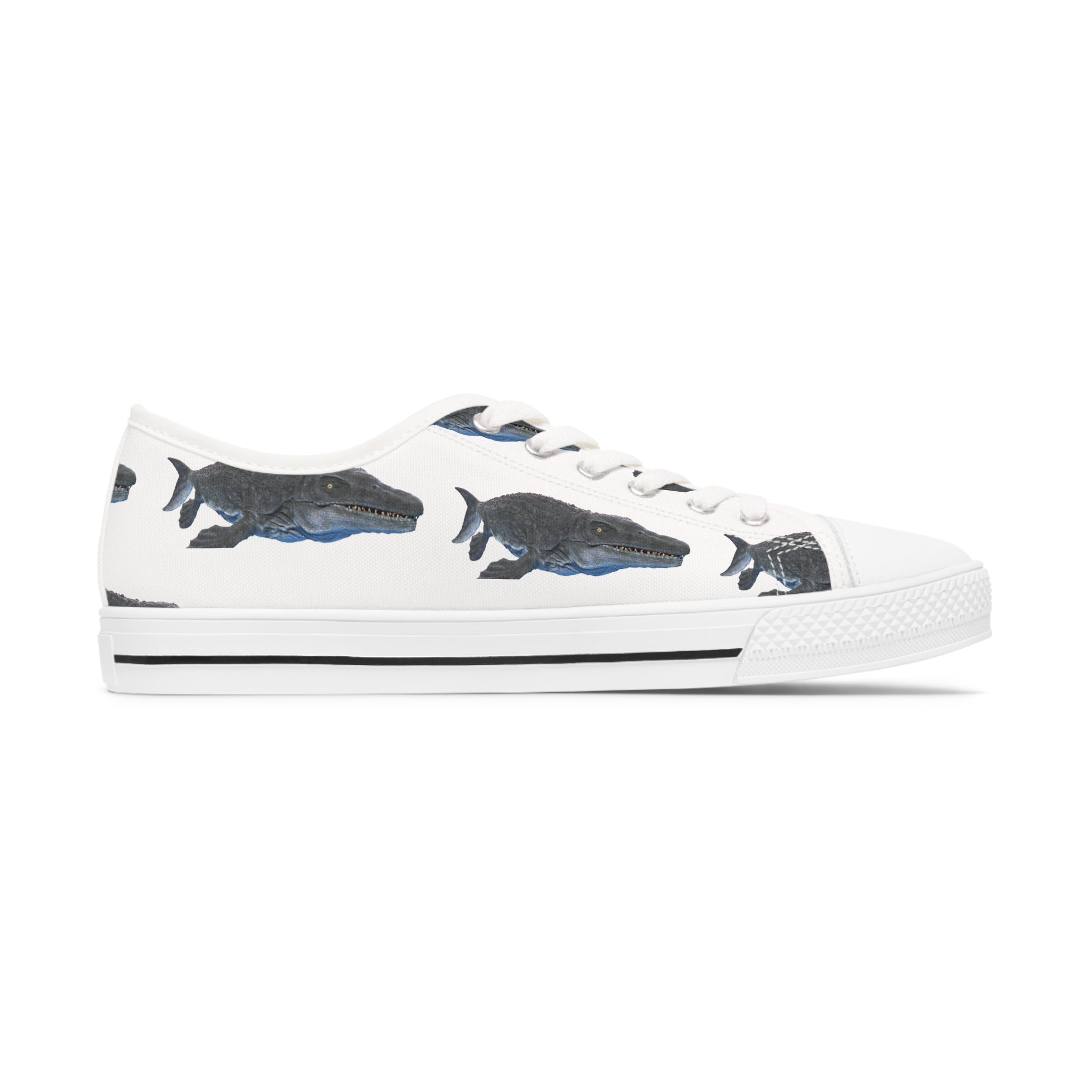 Mosasaurus Women's Low Top Sneakers in black and white with silver metal eyelets and lace-up closure, showcasing breathable canvas design.