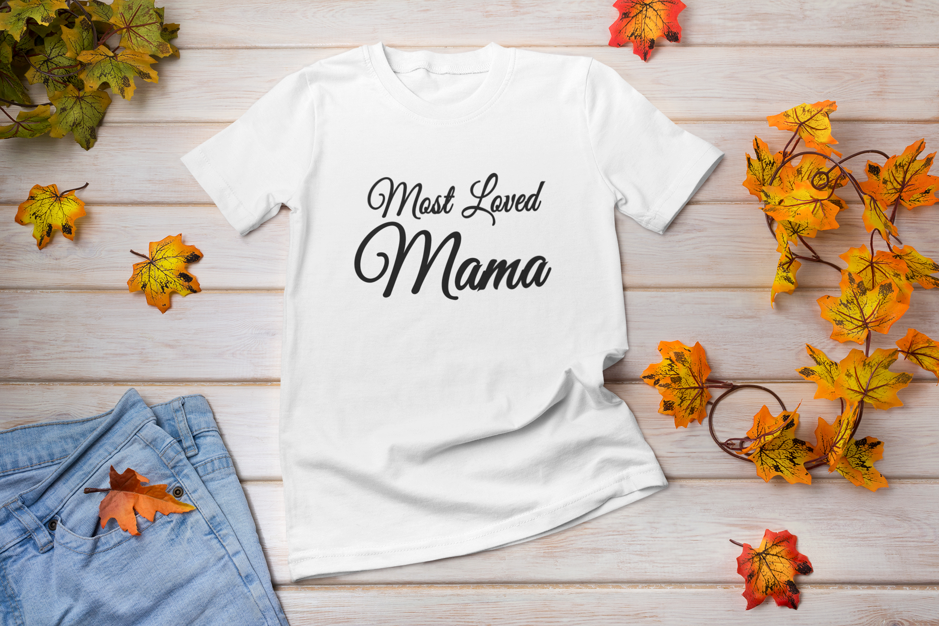 A stylish unisex T-shirt featuring 'Most Loved Mama' lettering, perfect for celebrating motherhood.