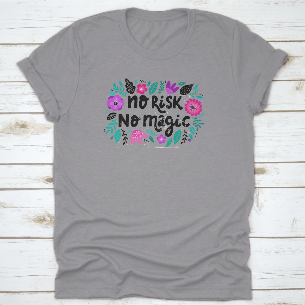 Motivational lettering quote 'No Risk No Magic' decorated with colorful flowers, showcasing a vibrant and inspiring design.