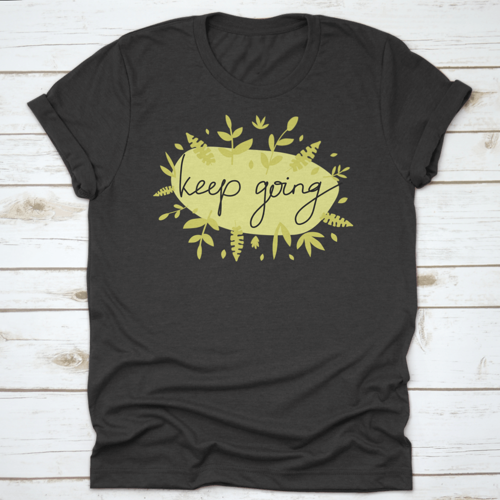 A stylish Motivational Message T-Shirt featuring modern lettering that says 'Keep Going', made from soft cotton fabric.