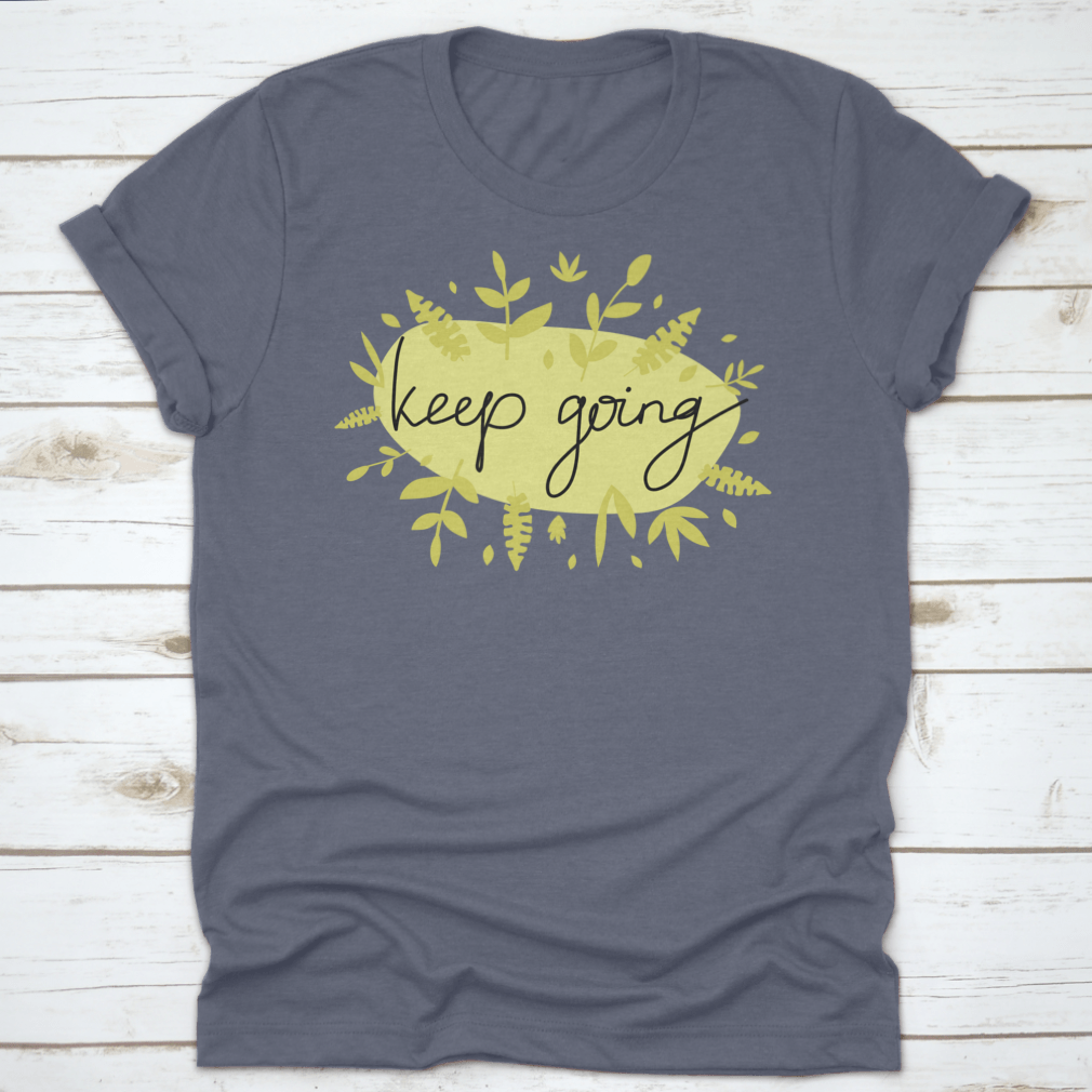 A stylish Motivational Message T-Shirt featuring modern lettering that says 'Keep Going', made from soft cotton fabric.