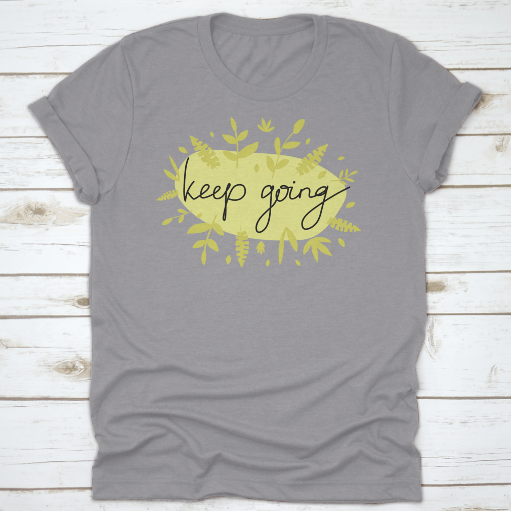 A stylish Motivational Message T-Shirt featuring modern lettering that says 'Keep Going', made from soft cotton fabric.