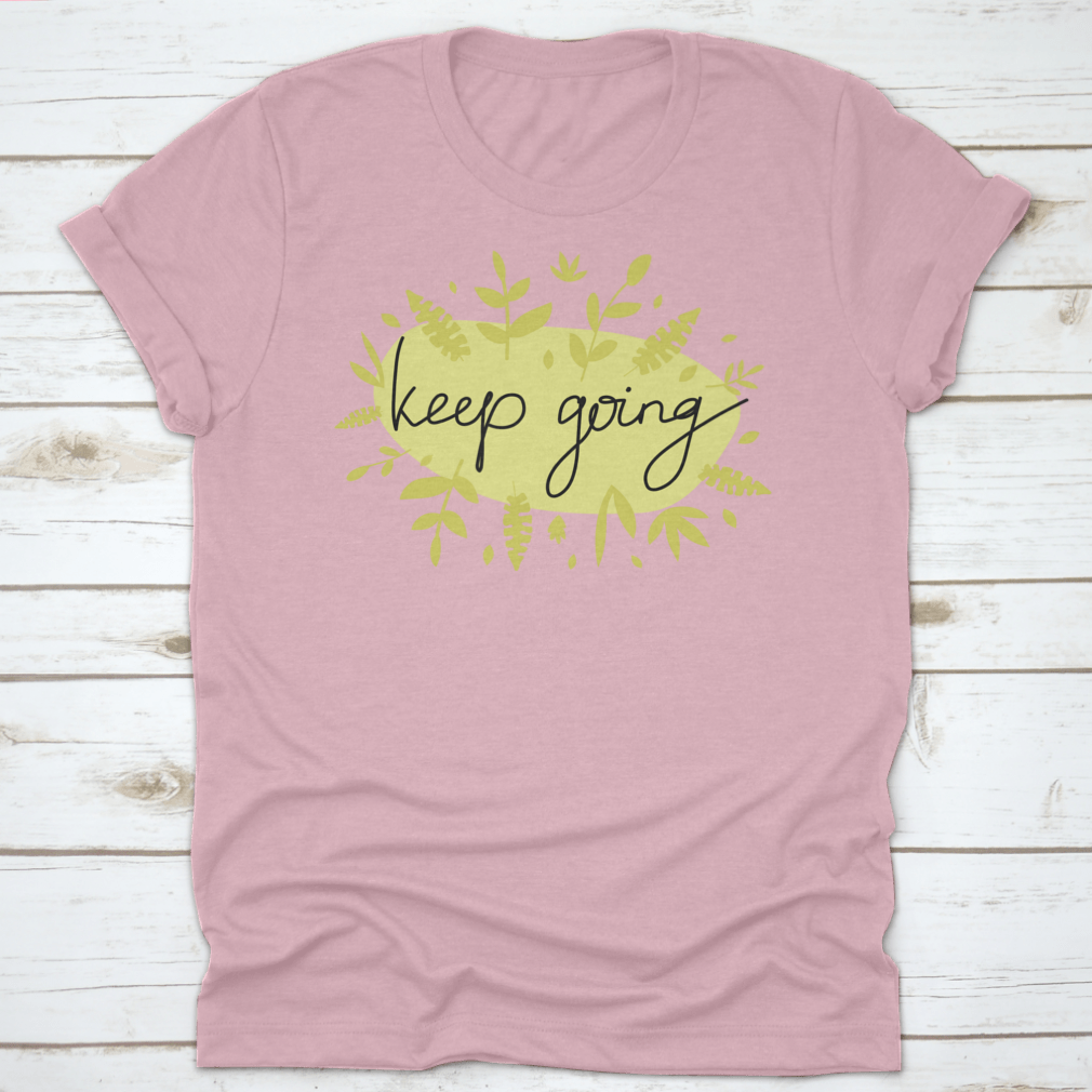 A stylish Motivational Message T-Shirt featuring modern lettering that says 'Keep Going', made from soft cotton fabric.