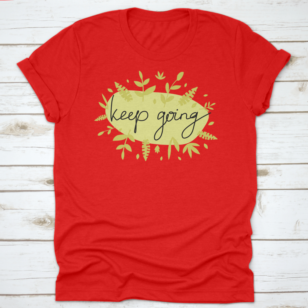 A stylish Motivational Message T-Shirt featuring modern lettering that says 'Keep Going', made from soft cotton fabric.