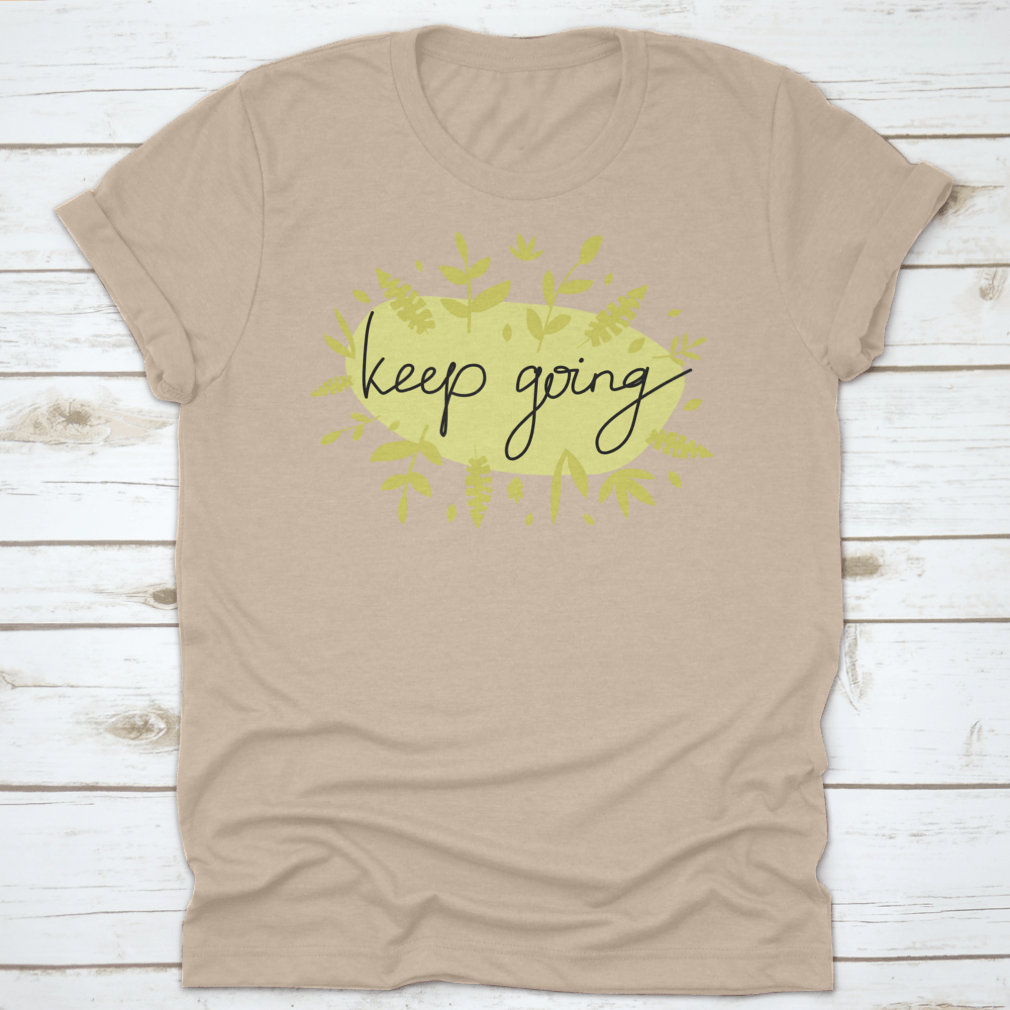 A stylish Motivational Message T-Shirt featuring modern lettering that says 'Keep Going', made from soft cotton fabric.