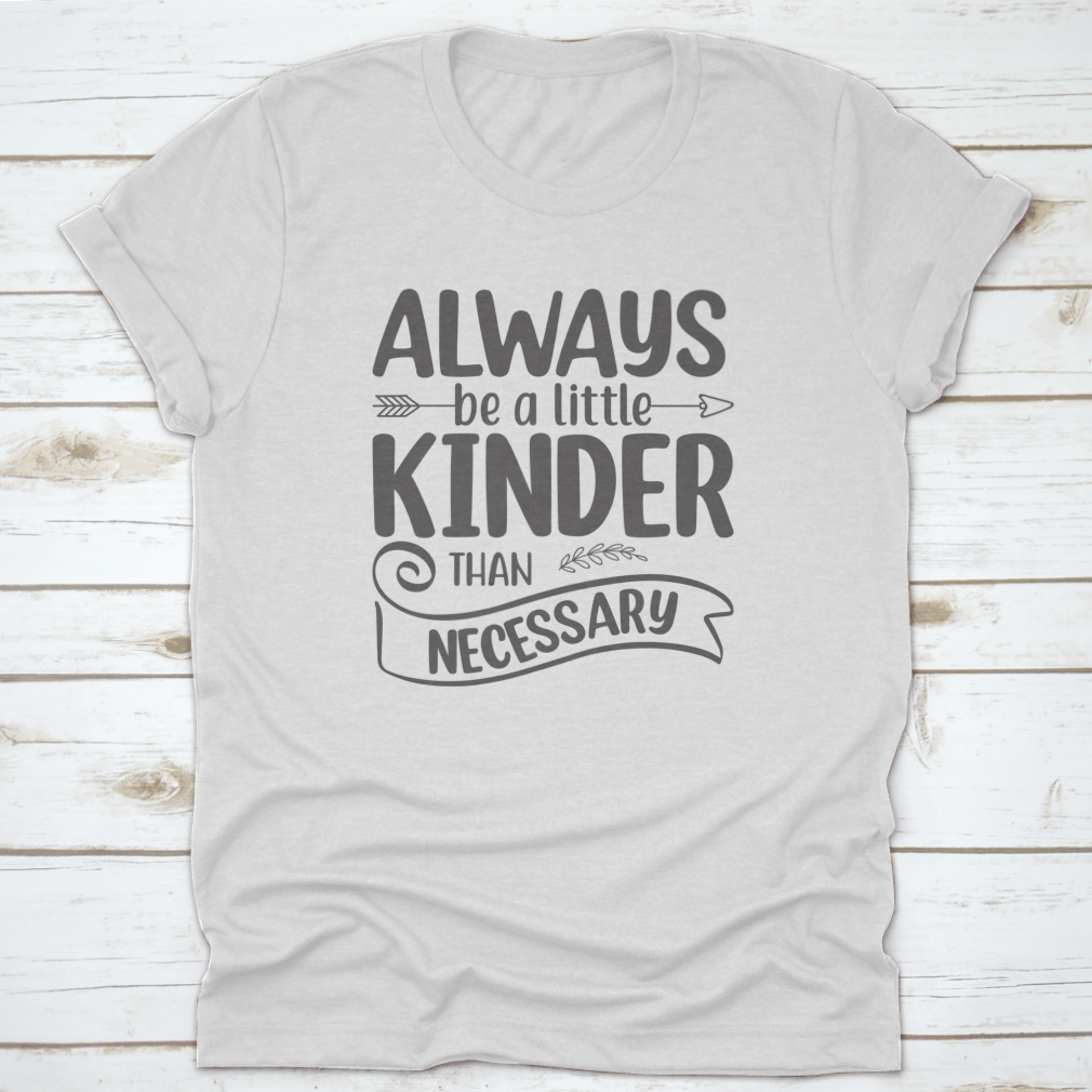 A comfortable cotton shirt featuring the motivational quote 'Always Be A Little Kinder Than Necessary' in a stylish design.