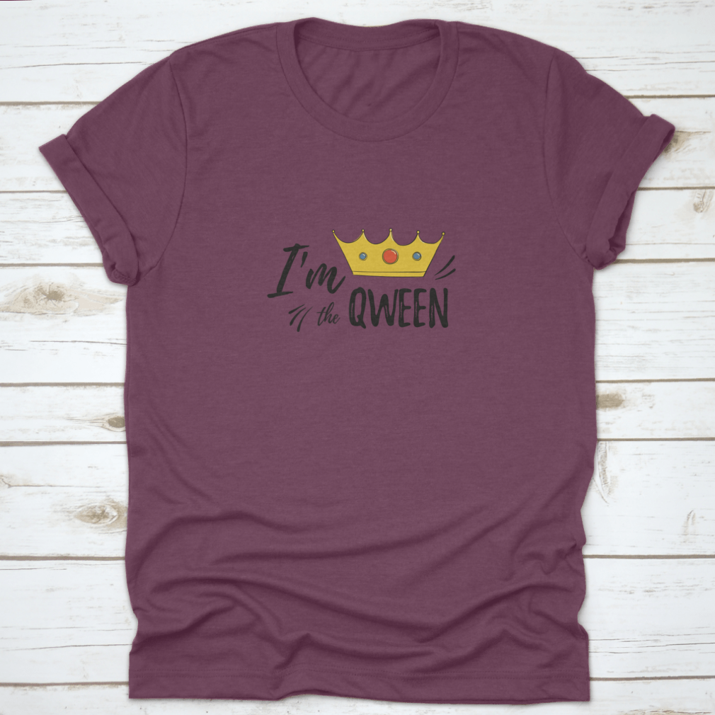 A stylish women's shirt featuring the motivational text 'I'M Qween' with a crown design, made from soft cotton fabric.