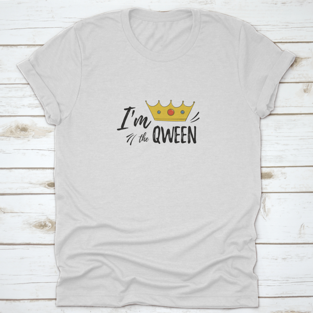 A stylish women's shirt featuring the motivational text 'I'M Qween' with a crown design, made from soft cotton fabric.