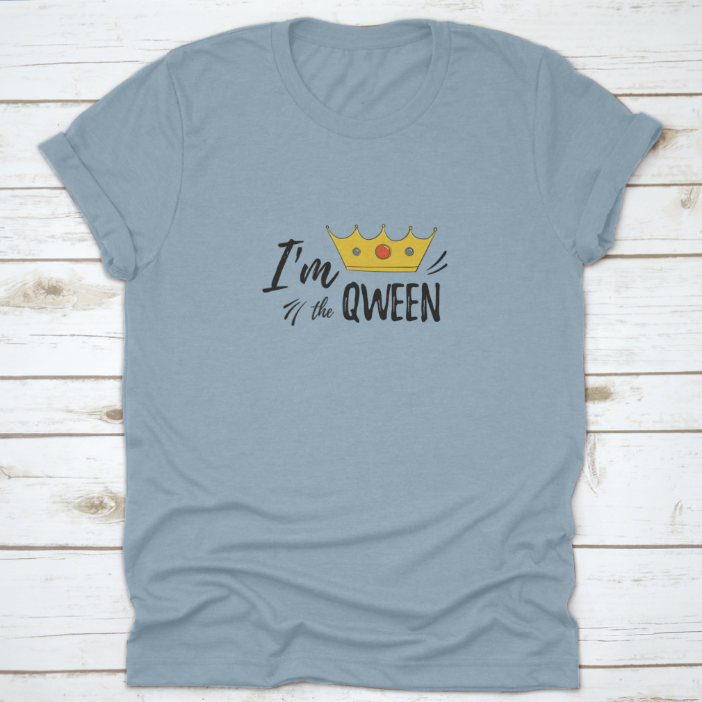 A stylish women's shirt featuring the motivational text 'I'M Qween' with a crown design, made from soft cotton fabric.