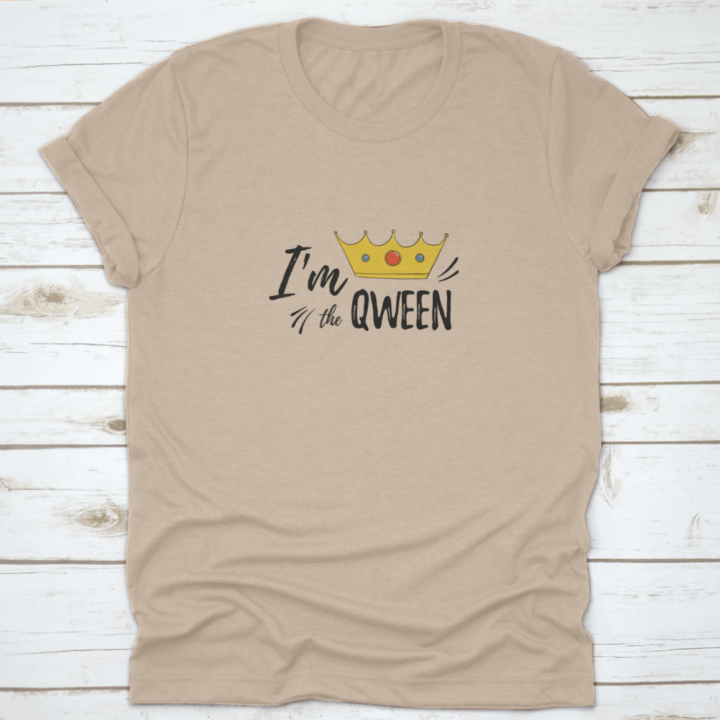 A stylish women's shirt featuring the motivational text 'I'M Qween' with a crown design, made from soft cotton fabric.