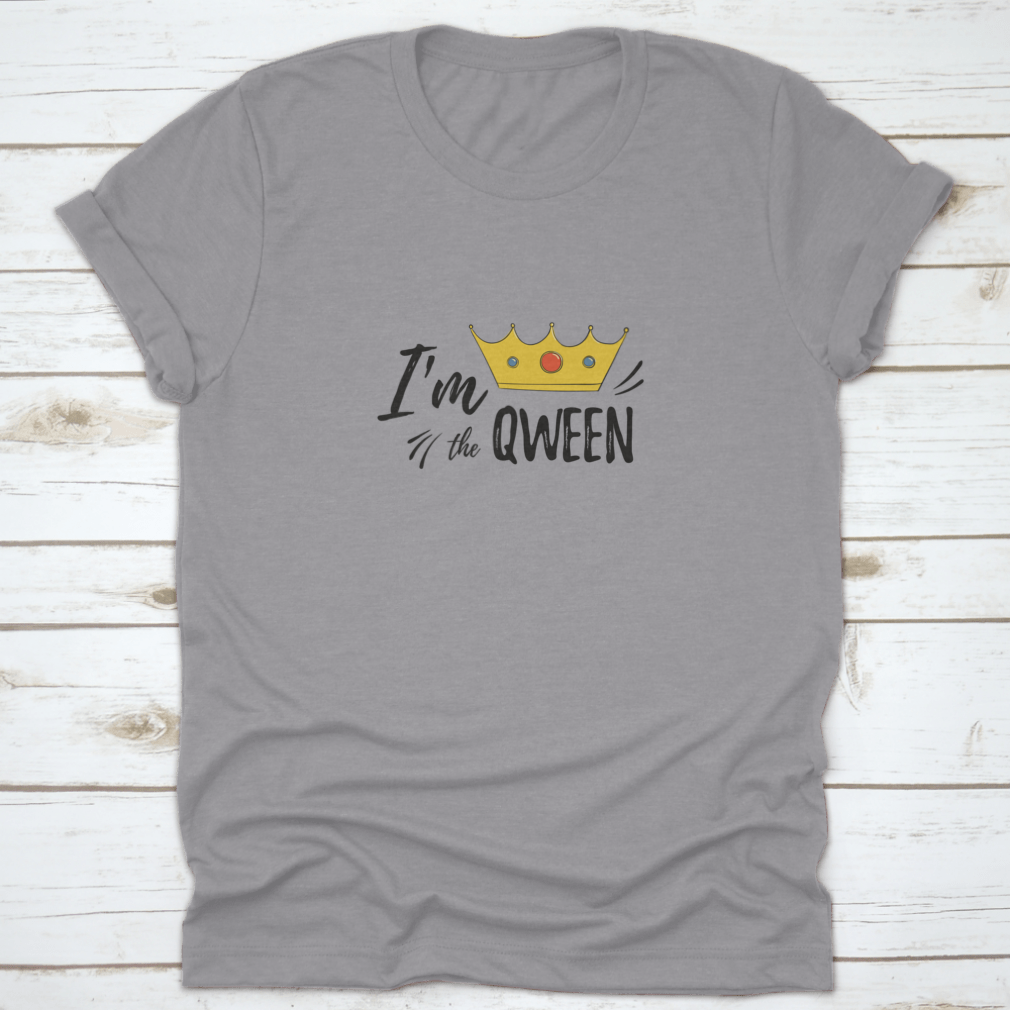 A stylish women's shirt featuring the motivational text 'I'M Qween' with a crown design, made from soft cotton fabric.