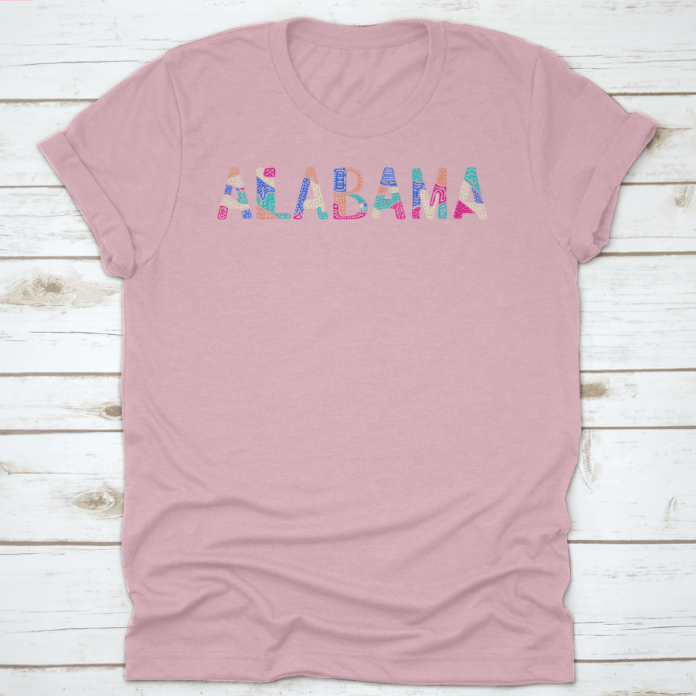 A vibrant multicolor T-shirt featuring a bright doodle design with patterned curves and crooked letters, showcasing a playful and artistic style.