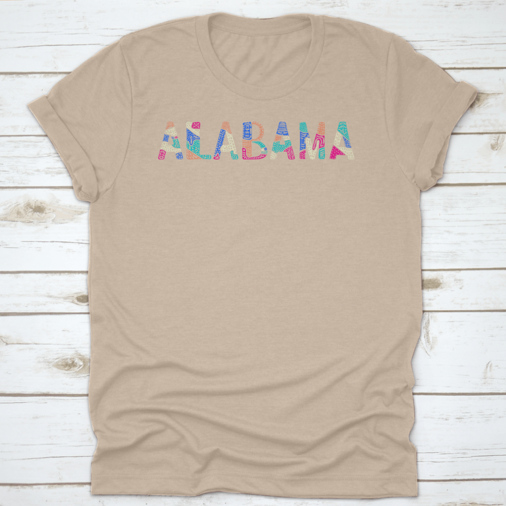 A vibrant multicolor T-shirt featuring a bright doodle design with patterned curves and crooked letters, showcasing a playful and artistic style.