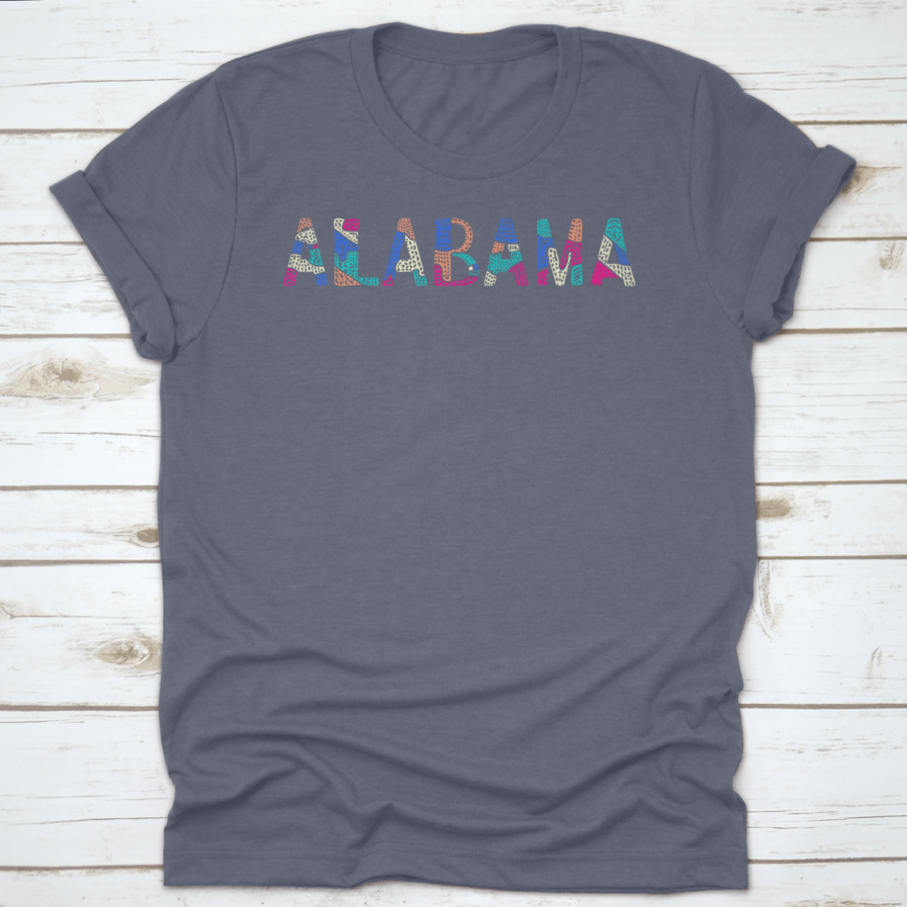 A vibrant multicolor T-shirt featuring a bright doodle design with patterned curves and crooked letters, showcasing a playful and artistic style.