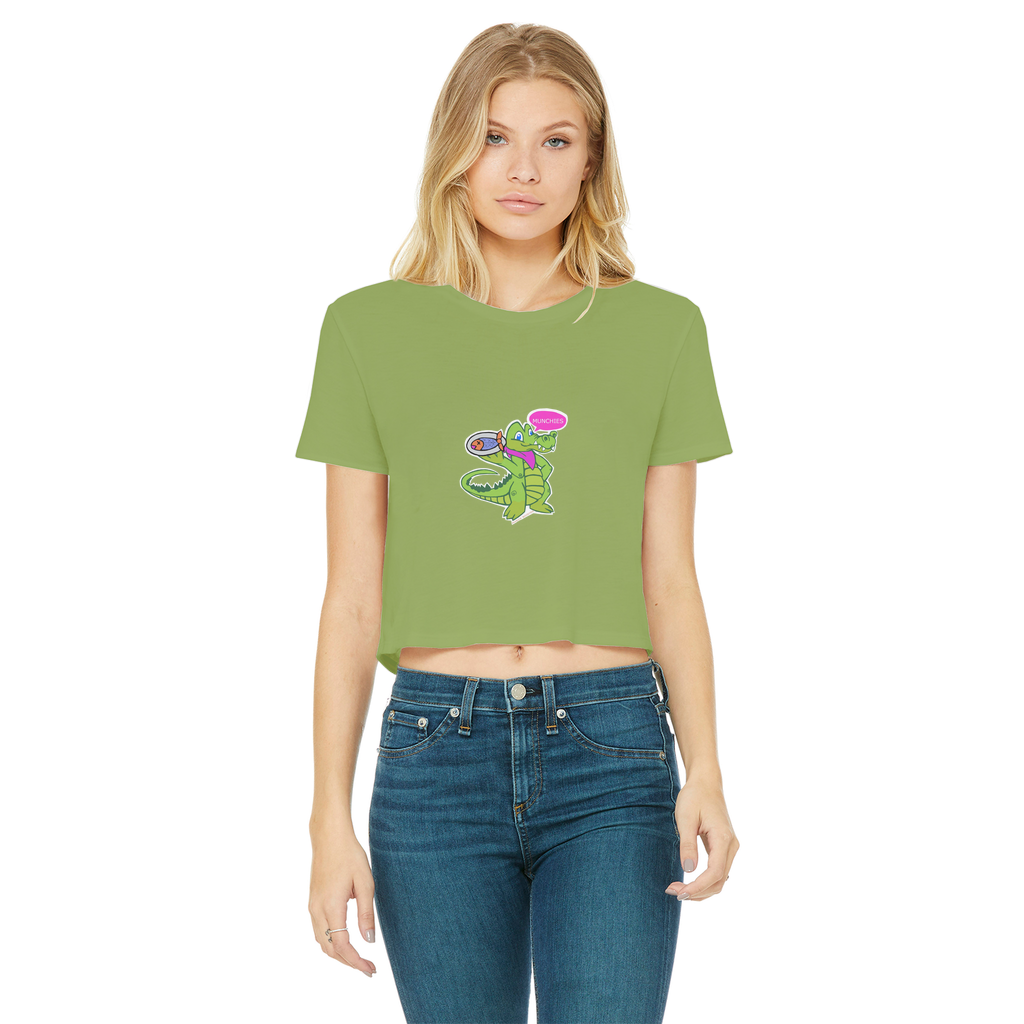 Munchies the Crocodile Classic Women's Cropped Raw Edge T-Shirt in various colors, showcasing its stylish design and raw edge hem.