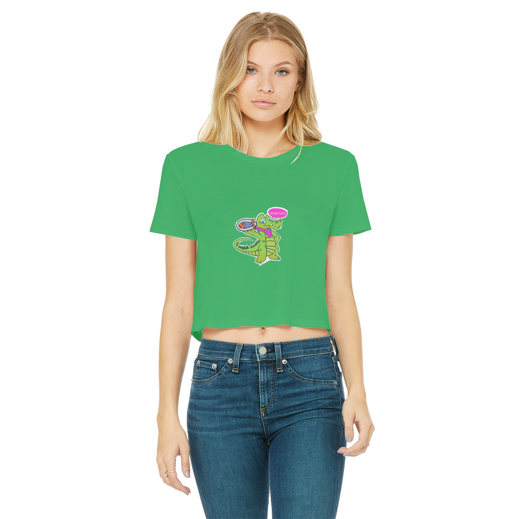 Munchies the Crocodile Classic Women's Cropped Raw Edge T-Shirt in various colors, showcasing its stylish design and raw edge hem.