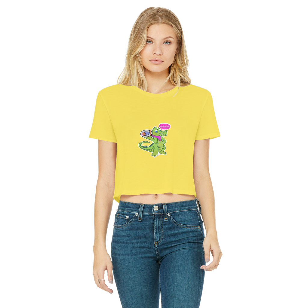 Munchies the Crocodile Classic Women's Cropped Raw Edge T-Shirt in various colors, showcasing its stylish design and raw edge hem.