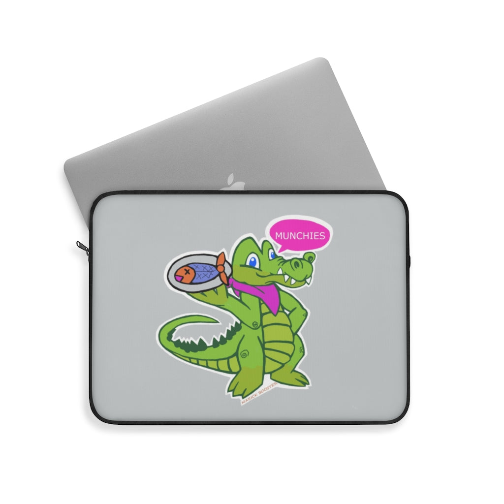 Munchies the Crocodile Laptop Sleeve featuring a stylish crocodile print on one side with a black backside and zipper.