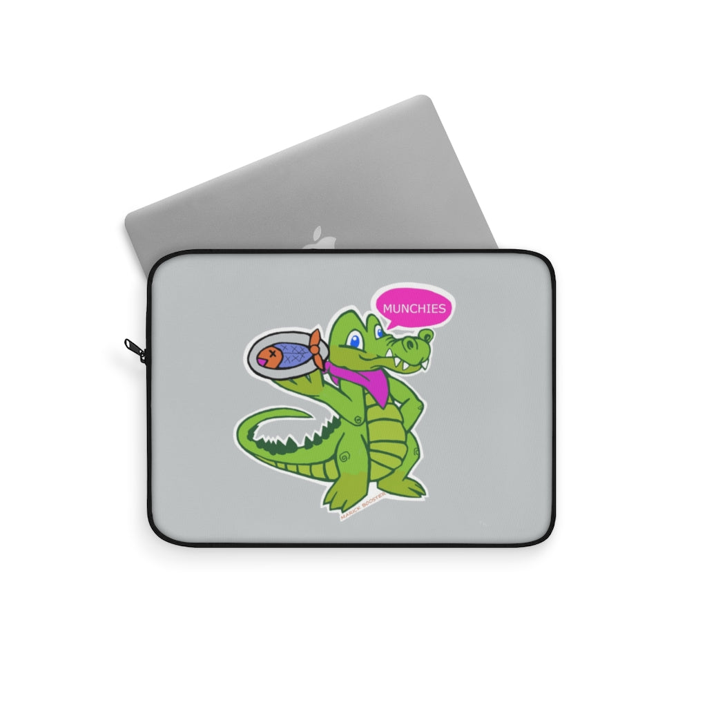 Munchies the Crocodile Laptop Sleeve featuring a stylish crocodile print on one side with a black backside and zipper.