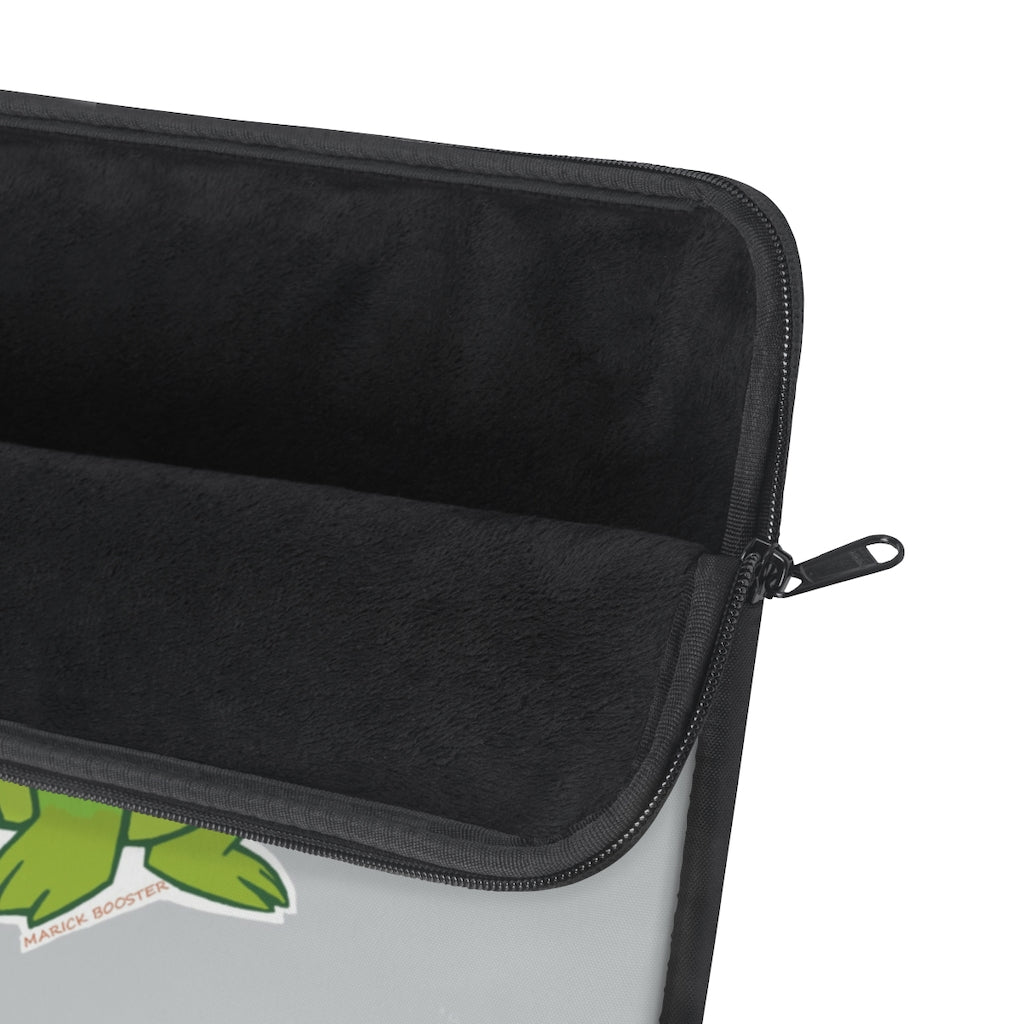 Munchies the Crocodile Laptop Sleeve featuring a stylish crocodile print on one side with a black backside and zipper.