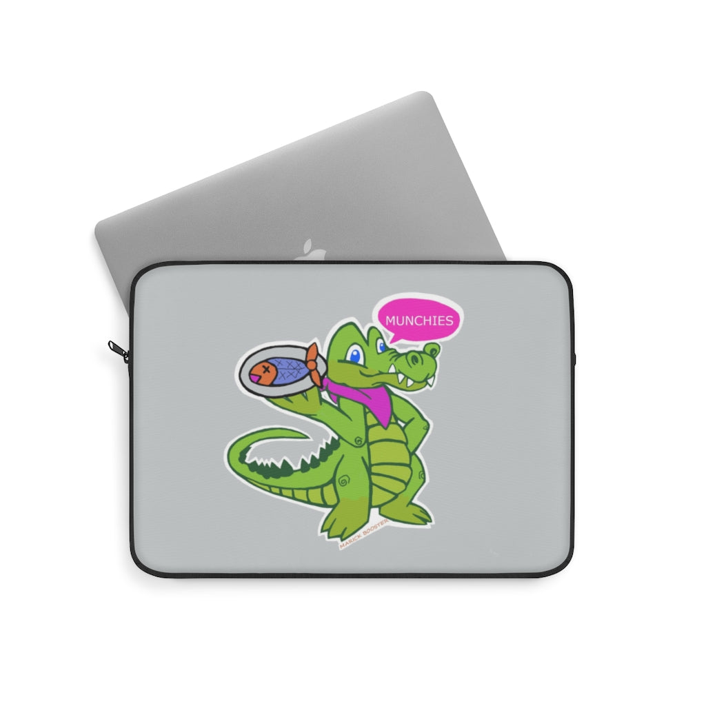 Munchies the Crocodile Laptop Sleeve featuring a stylish crocodile print on one side with a black backside and zipper.