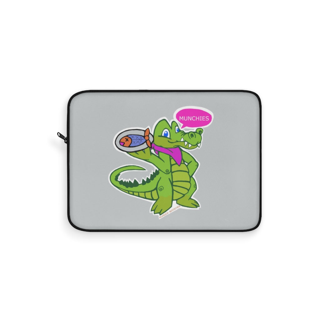 Munchies the Crocodile Laptop Sleeve featuring a stylish crocodile print on one side with a black backside and zipper.