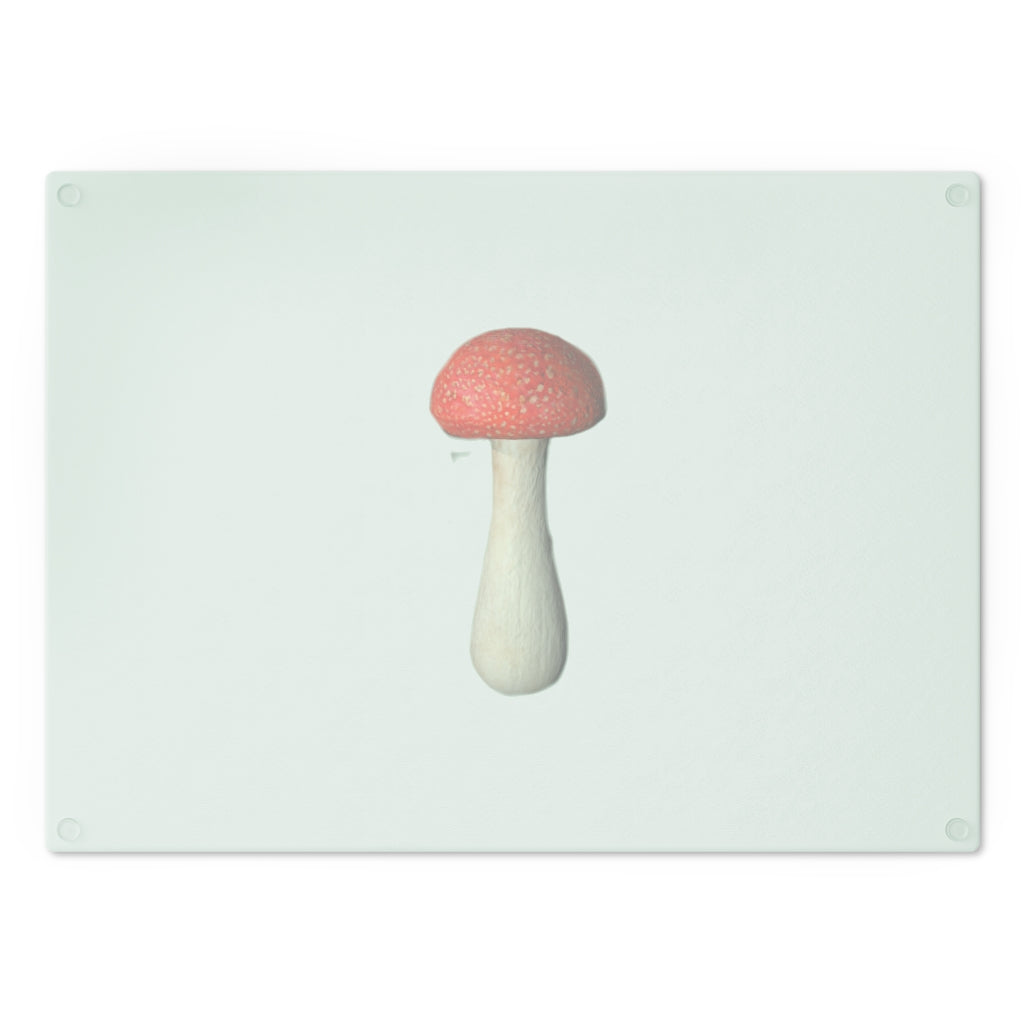 A stylish mushroom-themed tempered glass cutting board with rubber dots for stability, perfect for kitchen use.