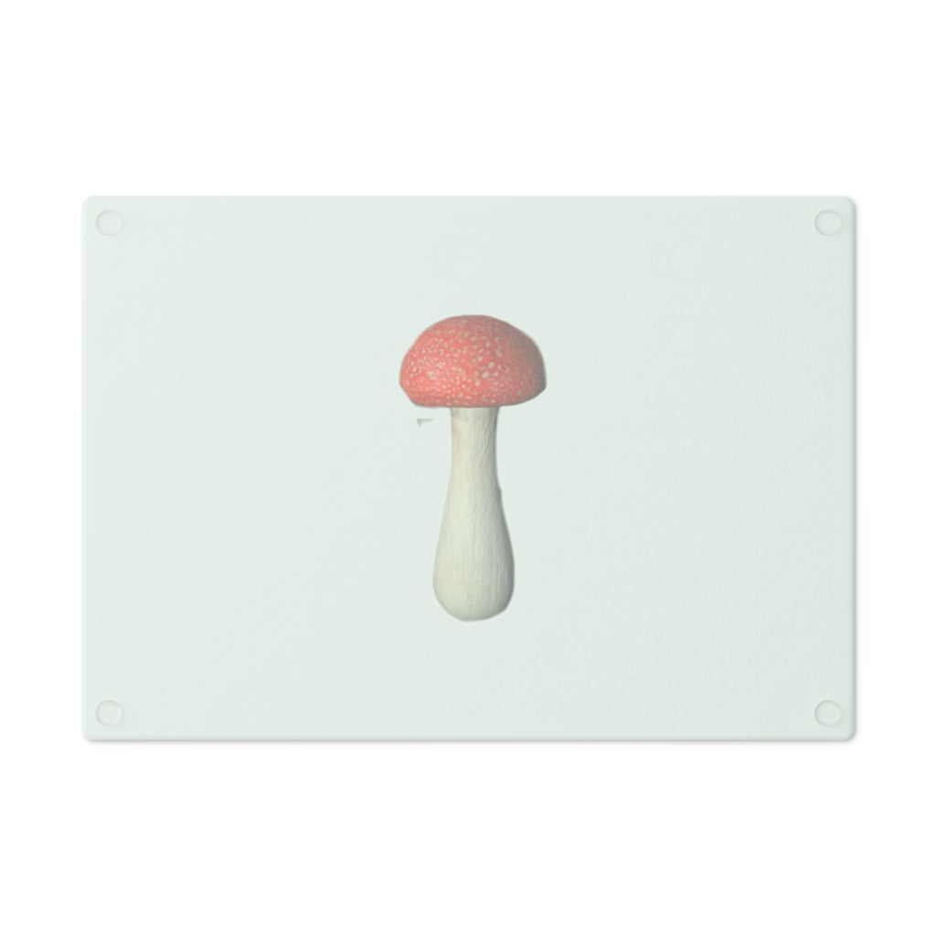 A stylish mushroom-themed tempered glass cutting board with rubber dots for stability, perfect for kitchen use.